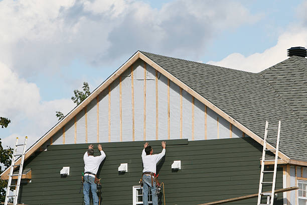 Professional Storm Damage Siding Repair technician working in Cabot, PA